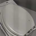 KOHLER 20454-96 Ridgewood Quiet-Close Elongated Toilet Seat, Slow Close, Grip Tight Bumpers and Installation Hardware, Biscuit