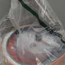 Dual Chamber Spin Mop and Bucket System, Separate Dirty Water, Set with Self-Wringing 360° Rotating Head, Includes 4 Washable Microfiber Pads. (Orange)