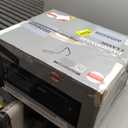 Farberware 1.1 Cu. Ft. Countertop Microwave Oven  1000 Watts Power, Auto Cook Settings, Defrost, Easy Clean and Child Safety Lock - Stainless and Black