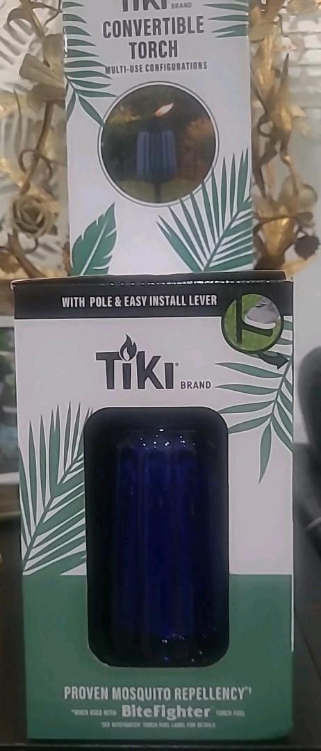 TIKI Brand Convertible Torch, designed for multi-use configurations in outdoor spaces.