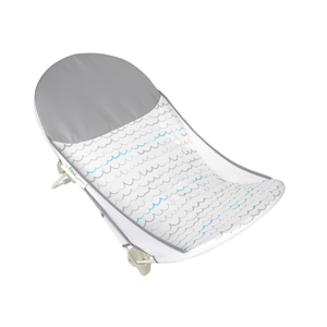 The First Years Sure Comfort Folding Baby Bather  Foldable Baby Bath Seat and Lounger for Home or On the Go  for Sink or Tub Use  NonSlip Seat  For Up to 15 Lbs