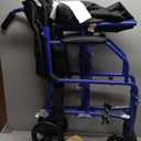 Medline Lightweight Foldable Transport Wheelchair with Handbrakes and 12-Inch Wheels, Blue Frame, Black Upholstery