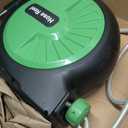 Retractable Garden Hose Reel 100FT x 1/2 in, Wall Mount Water Hose Reel for Outside with Auto Rewind, Tangle-Free Guide, 180 Swivel Bracket, Lock at Any Length, High-Pressure Flow, 10-Pattern Nozzle