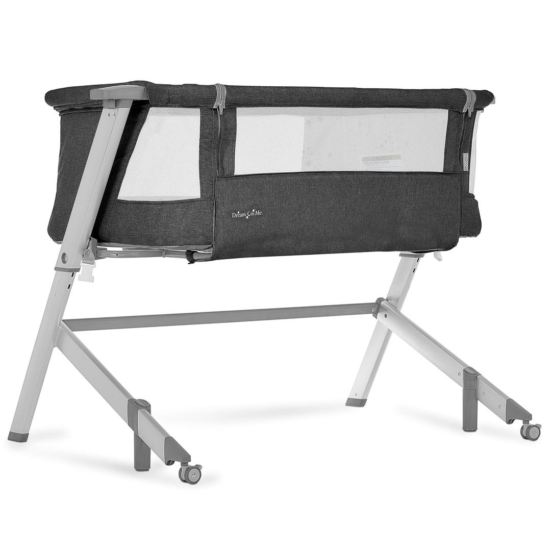 Dream On Me Skylar Bassinet and Bedside Sleeper, Adjustable Heights, Breathable Mesh Sides, Plush Mattress Pad, Wheels with Safety Locks & Tool-Free Assembly, Compact Fold & Travel Bag - Black