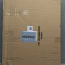 GCI OUTDOOR Freestyle Rocker with Side Table Camping Chair | Portable Folding Rocking Chair with Solid, Durable Armrests, Drink Holder & Comfortable Backrest  Heathered Indigo