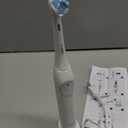 Oral-B Rechargeable Electric Toothbrush, iO2 Starter Kit, 3 Cleaning Modes, Automatic Pressure Sensor to Protect Gums, 2 Brush Heads, Pure White