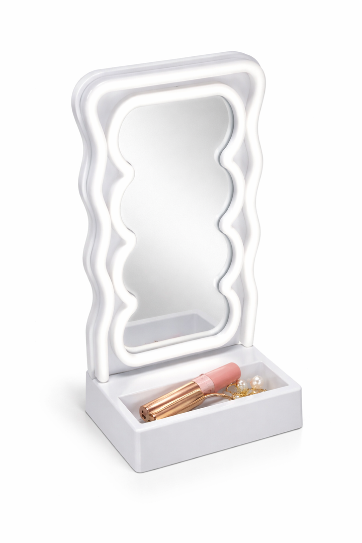 Orbit Wavy LED Light and Mirror Phone Holder is a multifunctional phone stand featuring a vibrant LED glow, a built-in mirror, and a trendy wave design for hands-free viewing