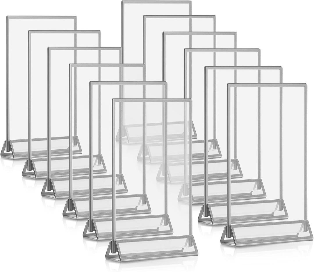 Blulu 12 Pack Acrylic Sign Holder Double Sided Picture Frame Wedding Table Number Stands with Border and Vertical Clear Display Menu Holders for Wedding Party Restaurant(5 x 7 Inch,Silver) Blulu 12 Pack Acrylic Sign Holder Double Sided Picture Frame Wedding Table Number Stands with Border and Vertical Clear Display Menu Holders for Wedding Party Restaurant(5 x 7 Inch,Silver)