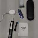 OralB iO Deep Clean Rechargeable Electric Powered Toothbrush, Black with iO Series 3 Limited, 2 Brush Heads and Travel Case  Pressure Sensor to Protect Gums  3 Cleaning Settings  2 Minute Timer