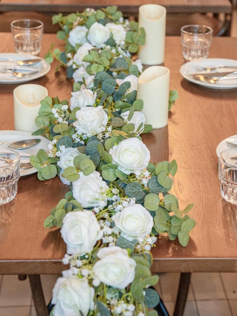 5FT Artificial Eucalyptus Garland with Flowers, 6 White Roses Baby Breath Garland Floral Greenery for Wedding Party Centerpiece Table Runner Backdrop Wall Decor Decoration