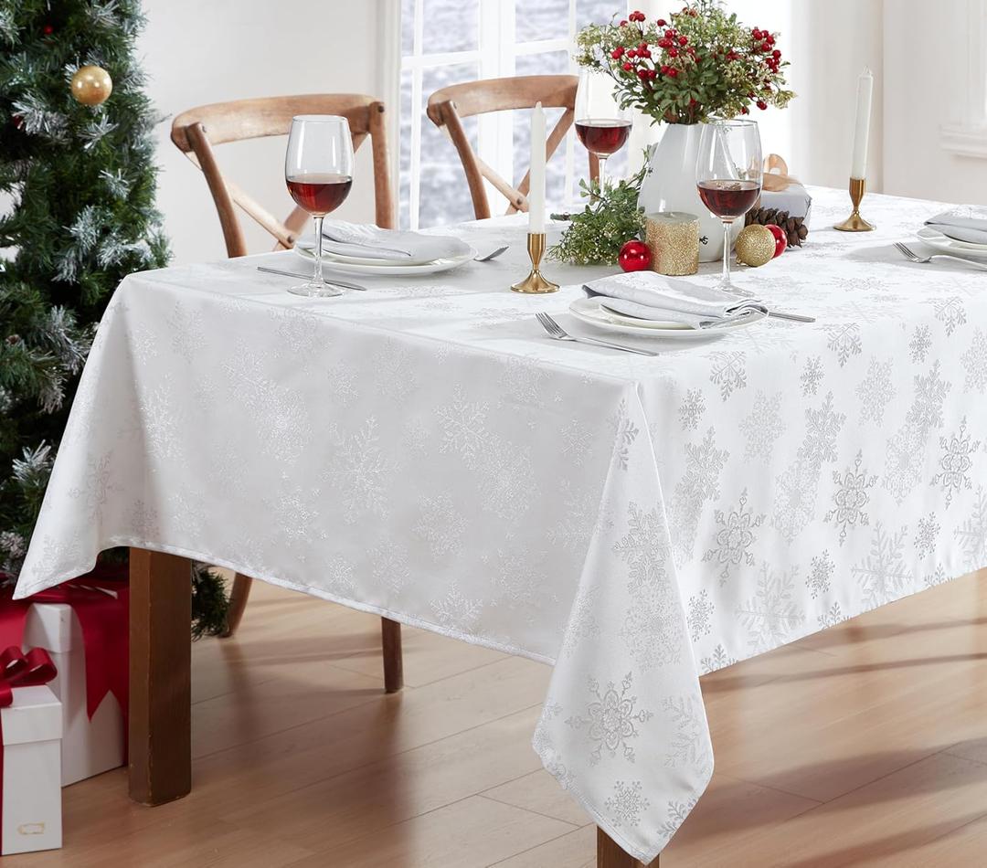 Newbridge Fancy Metallic Snowflake Christmas Fabric Tablecloth, 60 x 120 Inch Rectangle, White Silver, No-Iron Soil Resistant Sparkling Snowflakes Woven Holiday Table Cover