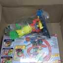 Hot Wheels Toy Car Track Set, City T-Rex Blaze Battle Playset & 1:64 Scale Die-Cast Vehicle, 18 Tall, Multiple Race Outcomes, Spinning Dinosaur Eyes