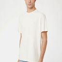 Men's short-sleeved T-shirt with a regular fit and hip length. Solid-tone design with a checkered texture and a Guess triangular appliqué on the upper left corner. With a round neckline.S