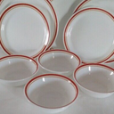 PorGlaze 12-Piece Porcelain Chip and Scratch Resistant Round Dinnerware Set, Plates, Dishes, Bowls, Service for 4 (Cozy Orange)