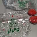 Henoyso 24 Pcs Red and Green Christmas Clear Gift Bags Plastic Goodie Candy Treat Bag with Handles PVC Gift Wrap Totes with Ribbon for Xmas Party Favors (7.8 x 7.8 x 3.1)