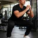 Men's Fleece Lined Joggers Stretch Thermal Athletic Sweatpants Tapered Fit with Zipper Pocket for Running Gym (Black, L)