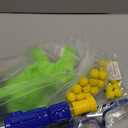 NIPLOOOW Moveable Dinosaur Shooting Toys for Kids 3-8 Years, Movable Shooting Target Toy with Air Pump Launcher, Interactive Competition Game Gift for Boys and Girls Ages 3 4 5 6 7 8 Years Old (1 Popper Gun)