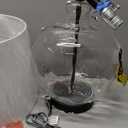 JONATHAN Y Rae Bedside Table Lamp 26.5" Clear Glass and Black Metal