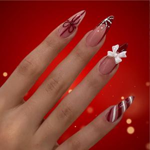 Christmas Press on Nails Red Medium Almond Fake Nails with 3D Bow Candy Cane Line Snowflake Gift Designs Full Cover Winter Press ons False Nails for Women Christmas Party 24 Pcs WYFHDT