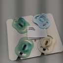 Tommee Tippee Stay Put Pacifier Set, Contains 2 Ultra-Light StayPut Glow in The Dark Pacifiers and 2 Ultra-Light StayPut Pacifiers, 0-6 Months, One-Piece Silicone Design, Pack of 4 (Blue Green)