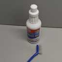 Clean-eez Grout-eez Tile Cleaner with Handheld Brush  32 oz Heavy-Duty Stain Remover for Ceramic and Porcelain Surfaces  Safe for Colored Grout  Not for Natural Stone  Bathroom & Kitchen Use