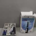 OralB Rechargeable Electric Toothbrush, iO3 Limited Deep Clean, 3 Cleaning Modes, Visual Pressure Sensor to Protect Gums, 2 Brush Heads, Travel Case, Black