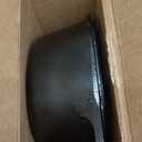 Lodge Cast Iron Dutch Oven - Loop Handle Cooking Vessel - Even Heat Retention - Oven-Safe, Versatile Pot - 7 Quart