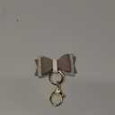 Itzy Ritzy Boss Bow Charm with Clasp - Cute Bow Bag Charm for Diaper Bags, Purses, Keychains & Wallets - Versatile & Stylish Vegan Leather Purse Accessory (Vanilla Latte)