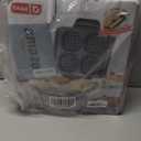 DASH Multi Mini Waffle Maker - Four 4 Waffle Molds, Nonstick Waffle Iron with Quick Heat-Up, Nonstick Surface - Perfect Mini Waffle Maker for Kids and Families, Just Add Batter (Graphite)