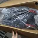 Medline Lightweight Foldable Transport Wheelchair with Handbrakes and 12-Inch Wheels, Red Frame, Black Upholstery