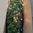 National Tree Company Pre-Lit 'Feel Real' Artificial Giant Full Downswept Christmas Tree, Green, Douglas Fir, White Lights, Includes Stand, 12 feet