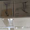 HUANUO Electric Standing Desk, 63 x 24 Inch Height Adjustable Computer Desk with Storage Bag, 4 Height Memory Settings, Sit Stand Up Desk for Home Office, White