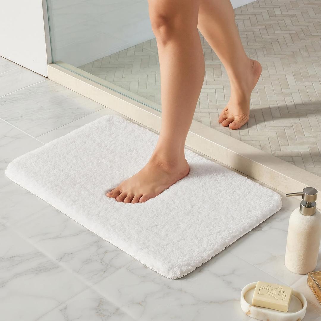 TYUU White Bathroom Rugs, Ultra Soft Bath Rugs Non Slip Washable, Super Absorbent Quick Dry Small Bath Mat with Rubber Backing for Bathroom Floor, Shower, or Sink, White 16" x 24"
