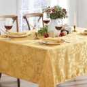 Newbridge Christmas Carol Holiday Noel Damask Fabric Tablecloth, 60 x 84 Inch Rectangle, Gold, Holly Leaf Poinsettia Weave, Wrinkle Free Soil Resistant Easy Care Table Cover
