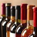 uxcell 100Pcs PVC Heat Shrink Capsules Wine Bottle Capsules Shrink Cap Wrap Shrink Top Cover Flower Pattern for Wine Cellars and Home Kitchen, Black 32x50mm