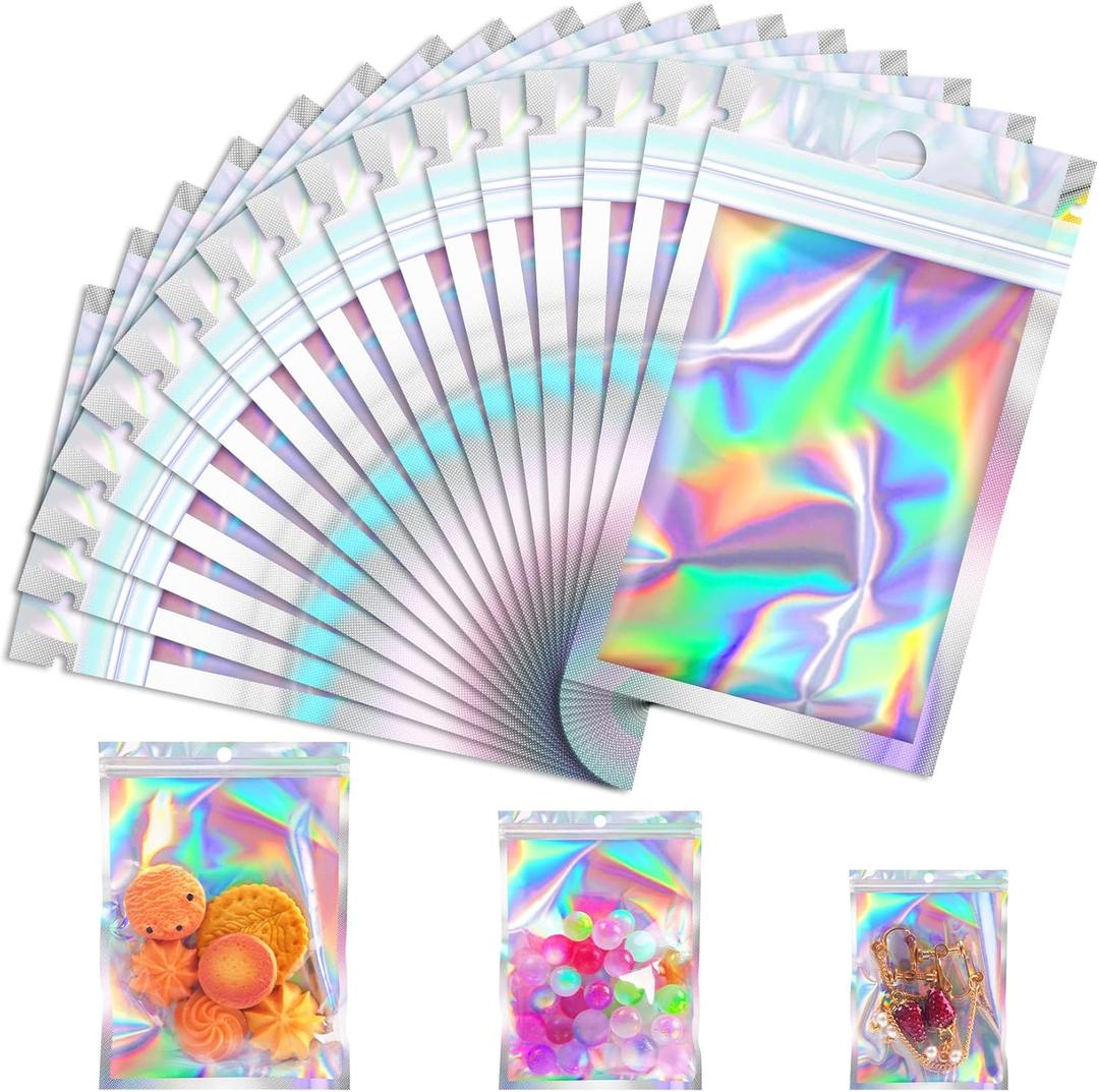 100 Pcs Resealable Mylar Bags, Smell Proof Goodie Bags with Clear Window, Small Holographic Bags for Halloween, Gift, Candy, Bracelet, Keychain, Treat, Product, Sealable Plastic Bags (2.4*3.9inch)