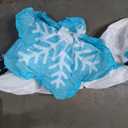 nflatable arch with snowman soldiers on both ends and a polar bear, blue snowflake, and cute Santa penguin in the middle of the archway