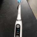 Oral-B iO Series 9 Electric Toothbrush with 3 Replacement Brush Heads, White Alabaster