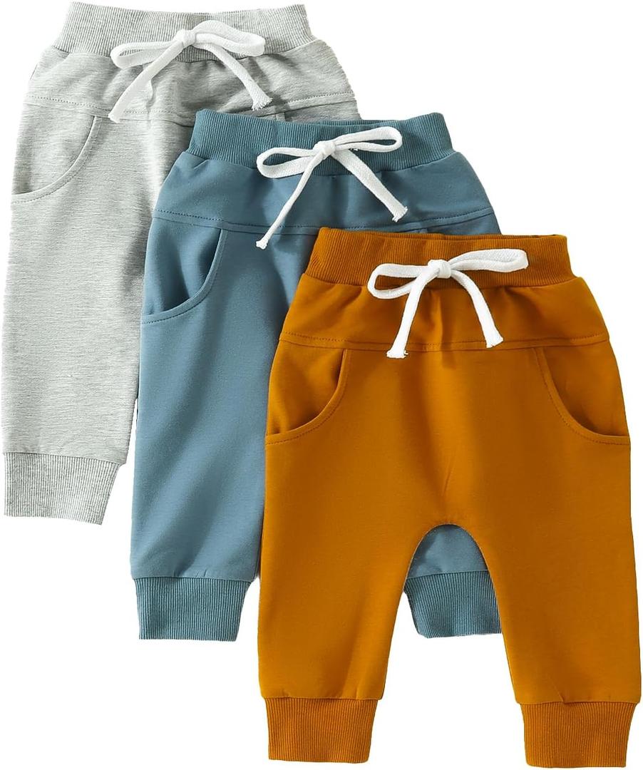 Arvbitana 3-Pack Toddler Boys Girls Pants Stretch Casual Solid Color Pants Elastic Waist Bottom Long Pants (B-Long Pants Blue-Brown-Grey,2-3T) Arvbitana 3-Pack Toddler Boys Girls Pants Stretch Casual Solid Color Pants Elastic Waist Bottom Long Pants (B-Long Pants Blue-Brown-Grey,2-3T)