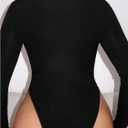 WDIRARA Women's Lace Up Deep V Neck Bodysuit Long Sleeve Criss Cross Sexy Body Suit (Black, S)