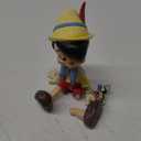 Enesco Disney Traditions Collection by Jim Shore Pinocchio and Jiminy Cricket Figurine- Resin Hand Crafted Painted Collectible Disney Figurines Decorative Home Decor Statue, 5.7 Inch