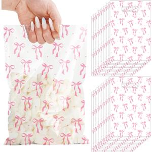 JarThenaAMCS 50Pcs Pink Bow Party Favor Bag Plastic Treat Bags with Handles Clear Candy Goodie Bags for Coquette Birthday Baby Shower