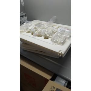 WHITE BABY CAGE ASSEMBLY KIT, WITH LOOSE PARTS.