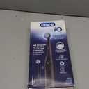 Oral-B iO Series 2 Rechargeable Electric Powered Toothbrush Starter Kit, Night Black with 2 Brush Heads - Automatic Pressure Sensor to Protect Gums - 3 Modes - 2 Min Timer
