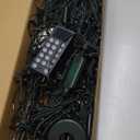 Decorative string lights with remote control. Includes a bundle of wired decorative lights, remote control, and is suitable for decorative or ambient lighting.