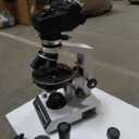 Radical Trinocular Polarizing Microscope W Rotating Stage Bertrand Lens Full Quarter Wave Plates and Camera Port RPL 3T
