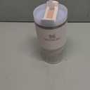 Stanley Quencher H2.0 Tumbler with Straw 20 oz | Flowstate 3-Position Lid | Cup Holder Compatible for Travel | Insulated Stainless Steel Cup | BPA-Free | Rose Quartz 2.0