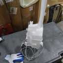 Windshield Washer Reservoir Expansion Tank with Pump and Cap Hose, 
Item Weight	‎2.94 pounds