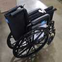 Medline Durable Steel Wheelchair with Flip-Back Desk-Length Arms, Elevated Leg Rests, 20-Inch Wide Seat, 300-Ib weight capacity, Black