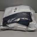 Xwincel 100% Blackout Curtains White and Silver Foil Pattern Curtains 63 Inches Long for Bedroom Metallic Silver Wave Print Drapes for Living Room Thermal Insulated Grommet Window Curtains 2 Panel Set